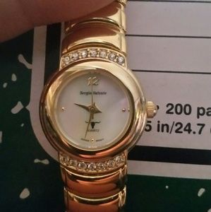 Woman's Sergio Valente Gold and Diamond Watch